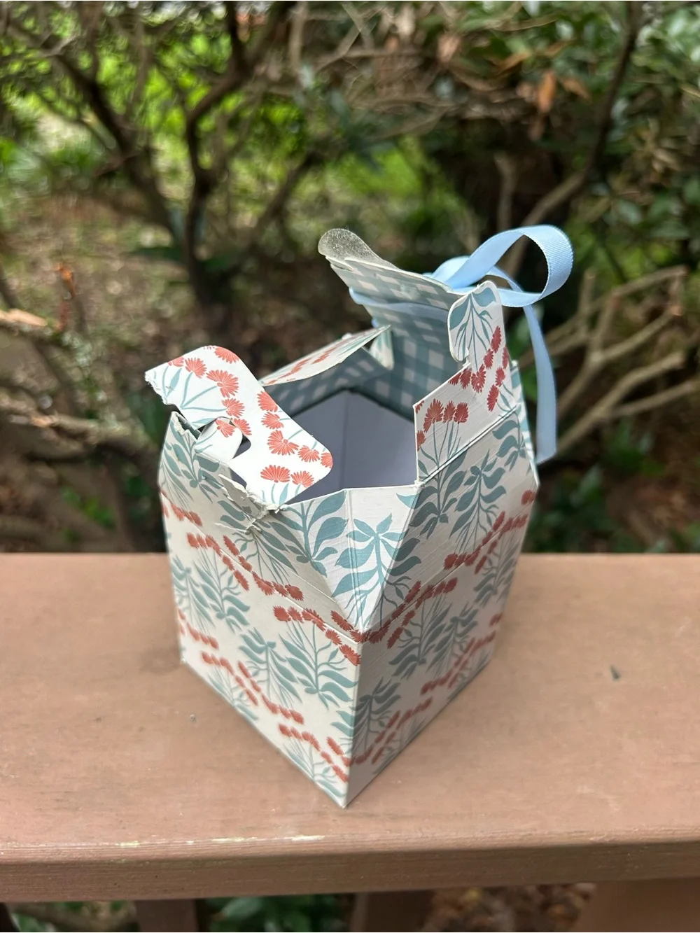 Anthropologie White Ceramic Candle with Blue Stripes and Red Floral Accents